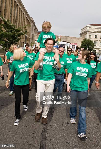 Jenny McCarthy, Evan Asher, Jim Carrey and Jane Carrey march toward the U.S. Capitol Building at the Green Our Vaccines rally on June 4, 2008 in...