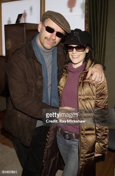 Xander Berkeley wearing Carrera Black Wolf sunglasses and Sarah Clarke in Stella McCartney 9S sunglasses