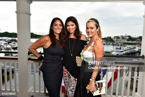 Lynn Scotti, Ena Espino Pereda, and Silvia Lopez de Mesa attend the Hamptons Magazine Celebration with Cover Star Karolina Kurkova on July 13, 2017...