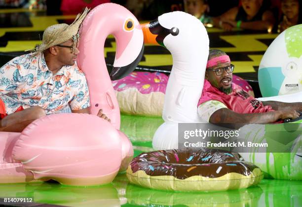 Host Russell Wilson and NFL player Von Miller onstage during Nickelodeon Kids' Choice Sports Awards 2017 at Pauley Pavilion on July 13, 2017 in Los...