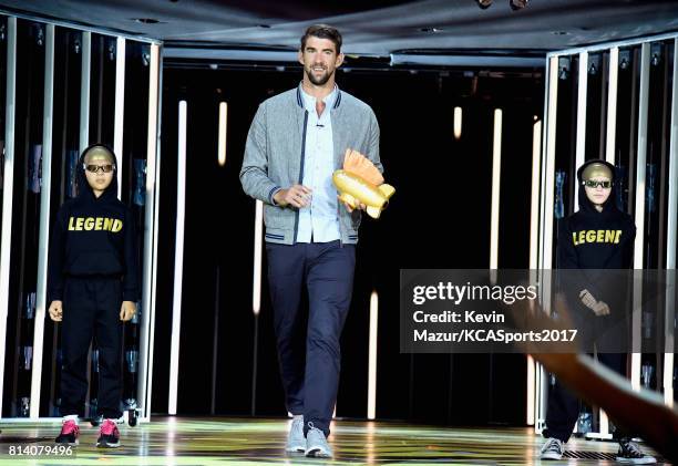 Honoree Michael Phelps accepts the Legend Award onstage during Nickelodeon Kids' Choice Sports Awards 2017 at Pauley Pavilion on July 13, 2017 in Los...