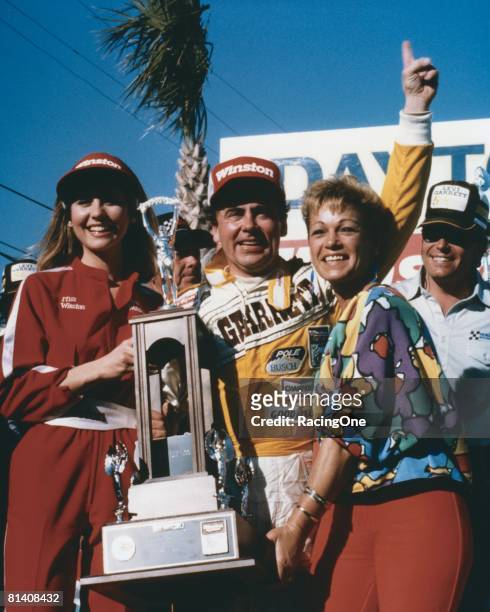 Geoff Bodine driver of the Levi Garrett Chevrolet celebrates in victory lane after winning the Winston Cup Daytona 500 on February 16, 1986 at the...