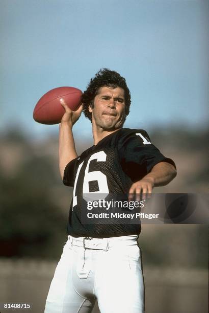 Football: Portrait of Oakland Raiders QB Jim Plunkett in action, making pass during mini camp, Oakland, CA 8/20/1981