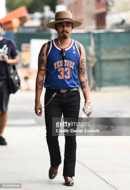 Denny Balmaceda is seen outside the Theory show during New York Fashion Week: Men's S/S 2018 at Skylight Clarkson Sq on July 13, 2017 in New York...