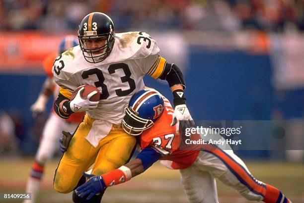 Football: AFC Playoffs, Pittsburgh Steelers Merril Hoge in action, rushing vs Denver Broncos Steve Atwater , Denver, CO 1/7/1990