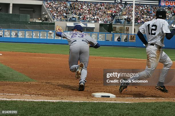 Baseball: New York Yankees Tony Womack in action, running bases vs Texas Rangers Mark Teixeira making catch, Bronx, NY 4/24/2005