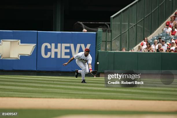 Baseball: Anaheim Angels Juan Rivera in action, making catch vs Detroit Tigers, Anaheim, CA 5/8/2005