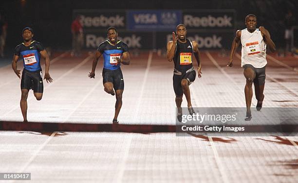 Jamaica's Usain Bolt sprints against Mike Rodgers,Leroy Dixon and Tyson Gay of USA during the Men's 100m at the Reebok Grand Prix at Icahn Stadium at...