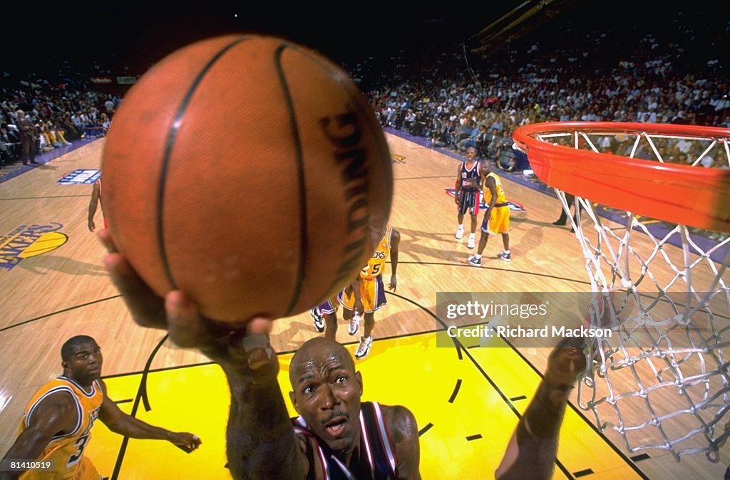NBA Playoffs, Houston Rockets Clyde Drexler in action, taking layup ...