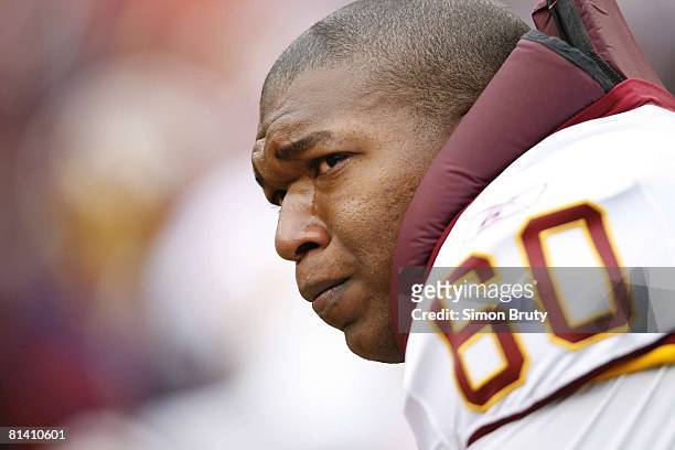 Football: Closeup of Washinton Redskins Chris Samuels upset, crying on sidelines during memorial tribute commemorating passing of teammate Sean...