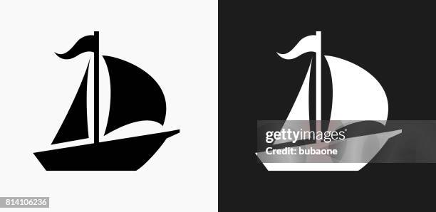 sailboat icon on black and white vector backgrounds - sailing icon stock illustrations