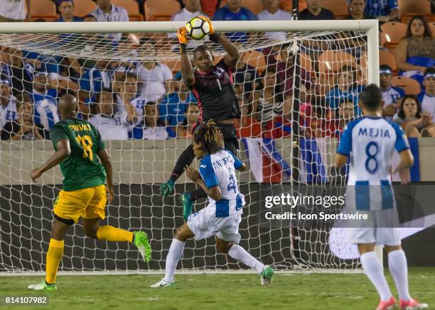 Honduras goalkeeper Luis Lopez leaps to trap a shot on goal during the CONCACAF Gold Cup Group A match between Honduras and French Guiana on July 11,...