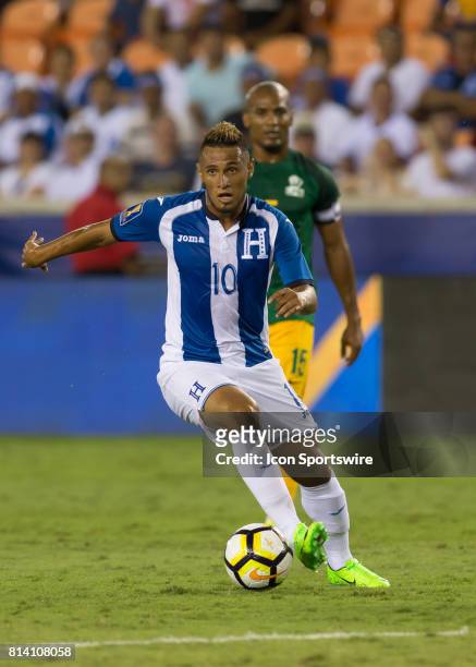 Honduras midfielder Alex Lopez moves the ball down the pitch during the CONCACAF Gold Cup Group A match between Honduras and French Guiana on July...