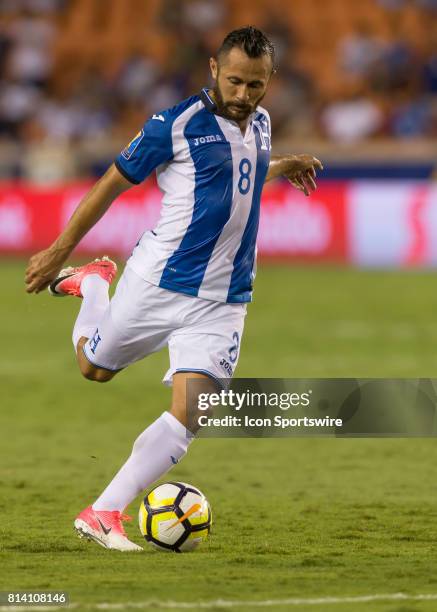 Honduras midfielder Alfredo Mejia prepares to strike on goal during the CONCACAF Gold Cup Group A match between Honduras and French Guiana on July...