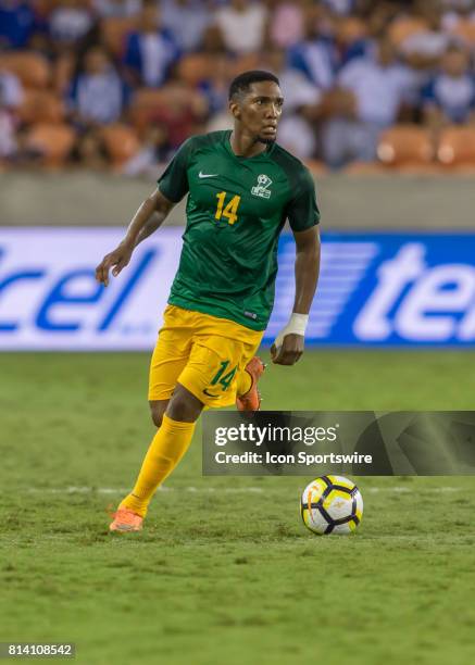 French Guiana defender Gregory Lescot looks for an open player during the CONCACAF Gold Cup Group A match between Honduras and French Guiana on July...