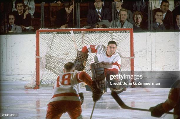 Hockey: Detroit Red Wings goalie Terry Sawchuk in action, making save vs New York Rangers, New York, NY