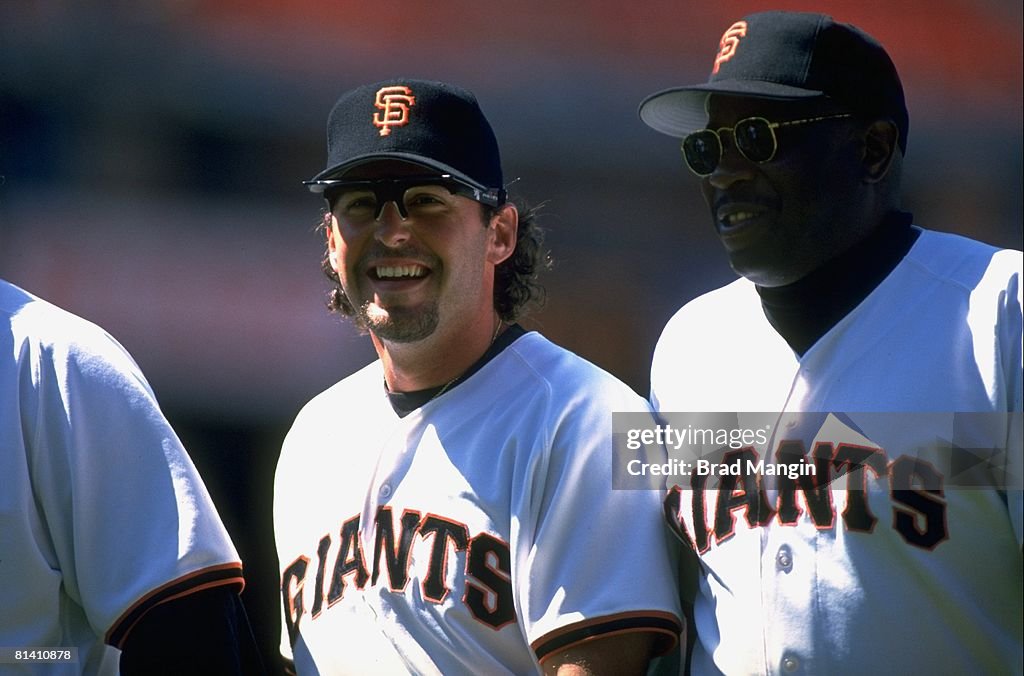 Jose R. Phillips San Francisco Giants manager Dusty Baker with J,R, Phillips during ...