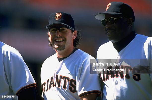 Baseball: San Francisco Giants manager Dusty Baker with J,R, Phillips during game vs San Diego Padres, San Francisco, CA 7/1/1995