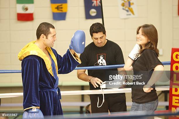 Junior Middleweight Boxing: WBC champion Oscar De La Hoya with wife Millie Corretjer during workout for Floyd Mayweather Jr, fight at Wilfredo Gomez...