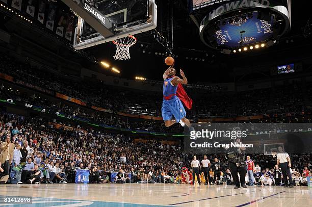 Basketball: NBA Slam Dunk Contest, Orlando Magic Dwight Howard in action, making dunk and wearing Superman cape during All Star Weekend, New Orleans,...