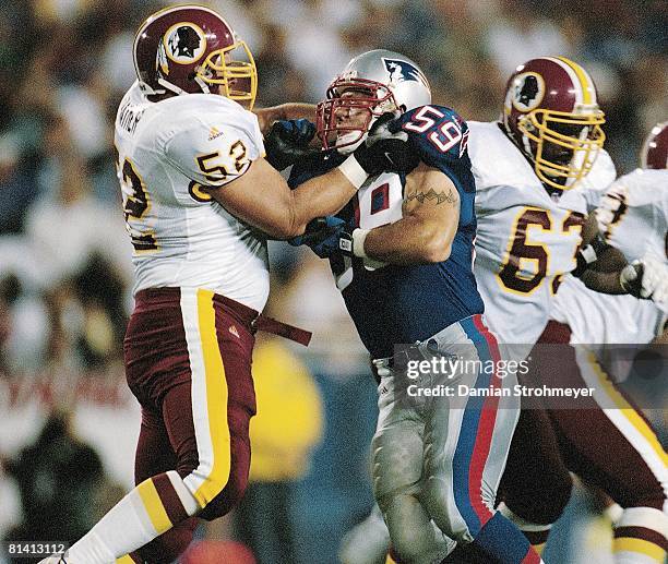 Football: New England Patriots Andy Katzenmoyer in action vs Washington Redskins Cory Raymer during preseason, Foxboro, MA 8/13/1999