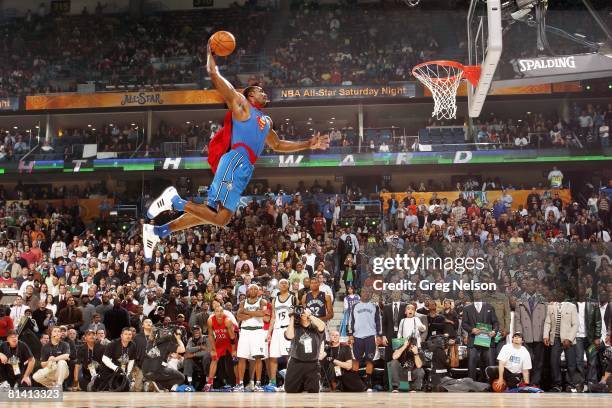 Basketball: NBA Slam Dunk Contest, Orlando Magic Dwight Howard in action, making dunk and wearing Superman cape during All Star Weekend, New Orleans,...