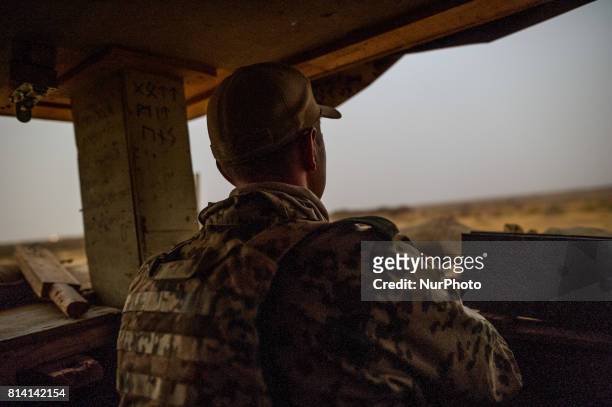 Member of the German Armed Forces secures the area surrounding the Camp Castor airfield in Gao, Mali, 19 May 2017. Members of the German armed forces...