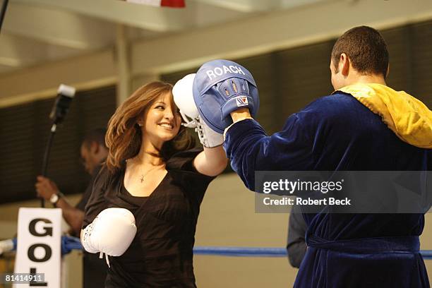 Junior Middleweight Boxing: WBC champion Oscar De La Hoya with wife Millie Corretjer during workout for Floyd Mayweather Jr, fight at Wilfredo Gomez...