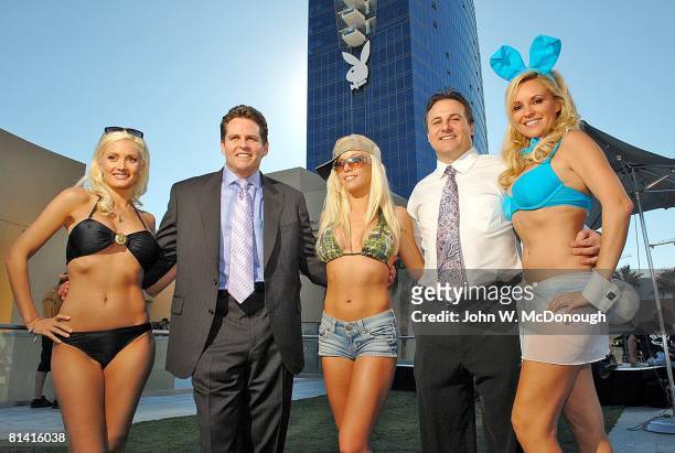 Basketball: Portrait of Sacramento Kings owners and brothers Joe Maloof and Gavin Maloof with Hugh Hefner's girlfriends, reality TV celebrities, and...