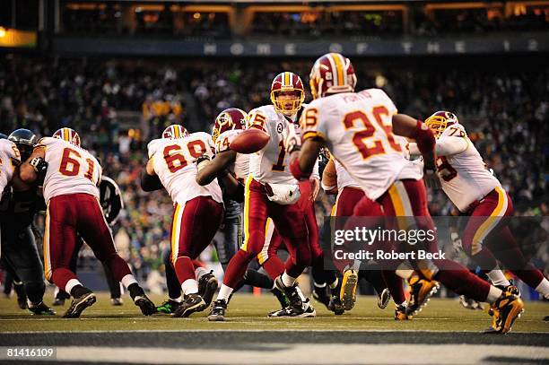 Football: NFC Playoffs, Washington Redskins QB Todd Collins in action, making pitch to Clinton Portis during game vs Seattle Seahawks, Seattle, WA...