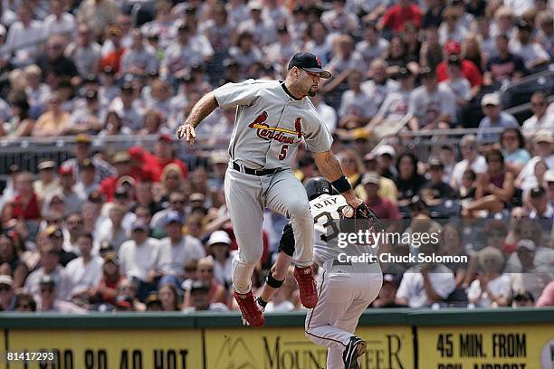 Baseball: St, Louis Cardinals Albert Pujols in action, attempting tag vs Pittsburgh Pirates Jason Bay , No out, Pittsburgh, PA 6/30/2004