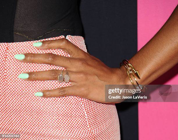 Kelly Rowland, jewelry and nail detail, attends the premiere of "Girls Trip" at Regal LA Live Stadium 14 on July 13, 2017 in Los Angeles, California.