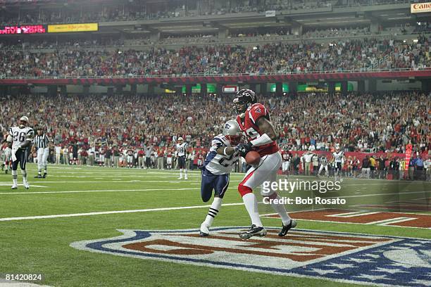 Football: Atlanta Falcons Dez White in action, attempting catch in endzone vs New England Patriots Asante Samuel , Atlanta, GA 10/9/2005