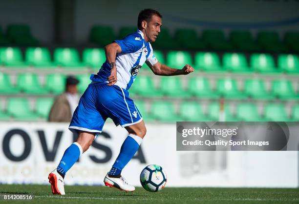 Fernando Navarro of Deportivo de La Coruna runs with the ball during the pre-season friendly match between Deportivo de La Coruna and Racing...