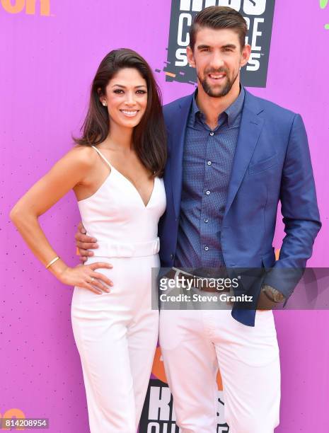 Nicole Johnson, Michael Phelps arrives at the Nickelodeon Kids' Choice Sports Awards 2017 at Pauley Pavilion on July 13, 2017 in Los Angeles,...