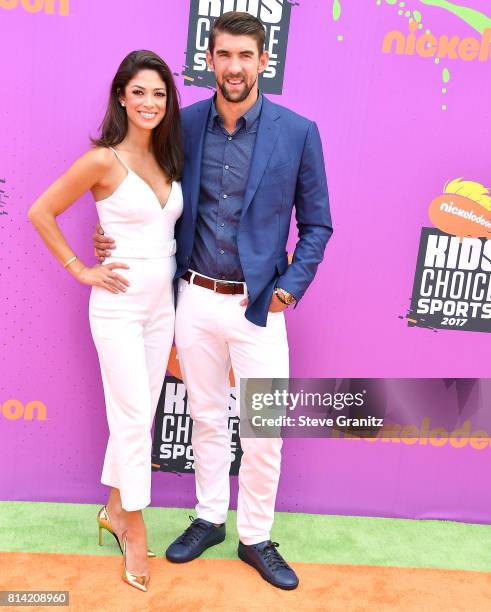 Nicole Johnson, Michael Phelps arrives at the Nickelodeon Kids' Choice Sports Awards 2017 at Pauley Pavilion on July 13, 2017 in Los Angeles,...