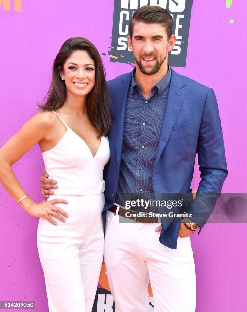 Nicole Johnson, Michael Phelps arrives at the Nickelodeon Kids' Choice Sports Awards 2017 at Pauley Pavilion on July 13, 2017 in Los Angeles,...