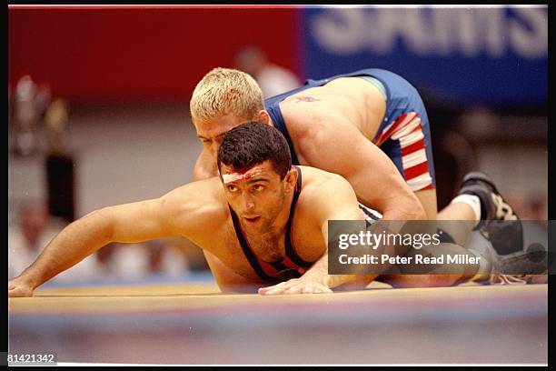 Wrestling: 32nd World Freestyle Championships, USA Les Gutches in action vs Ukraine during 187,25lb championship match at Yenisei Sports Palace, UKR...