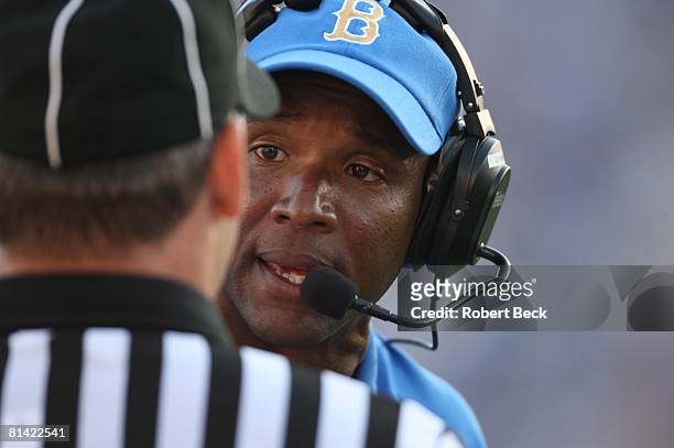 College Football: Closeup of UCLA coach Karl Dorrell talking to referee during game vs Brigham Young, Pasadena, CA 9/8/2007