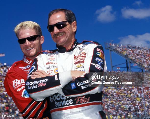 Auto Racing: NASCAR Pepsi 400, Closeup portrait of Dale Earnhardt Jr, and his father Dale Earnhardt Sr, before race at Michigan Speedway, Brooklyn,...