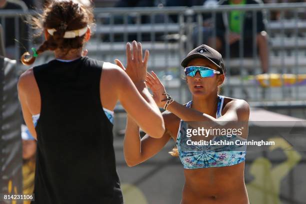 Geena Urango and Angela Bensend celebrate a point in the semifinal match against Alix Klineman and Lane Carico during day 4 of the AVP San Francisco...