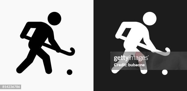 hockey icon on black and white vector backgrounds - hockey player black background stock illustrations