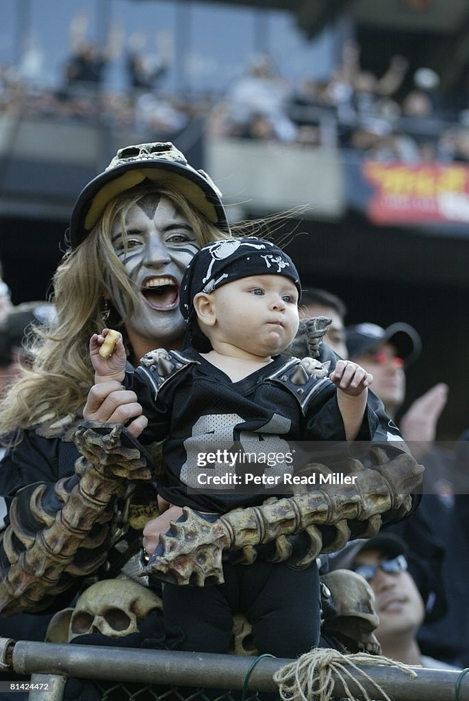 Closeup Of Painted Oakland Raiders Fans In Black Hole During Game Vs closeup-of-painted-oakland-raiders-fans-in-black-hole-during-game-vs