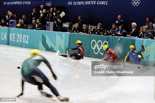 Speed Skating: 2002 Winter Olympics, AUS Steven Bradbury in action during short track 1000 finals as USA Apolo Ohno, CAN Mathieu Turcotte, and KOR...