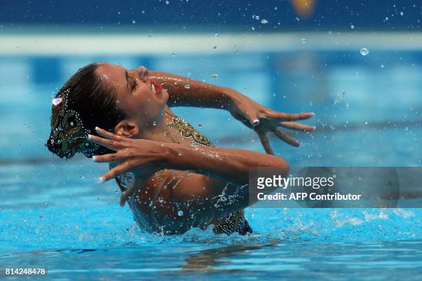 Austria's Vasiliki Alexandri competes in the Women Solo technical preliminary during the synchronised swimming competition at the 2017 FINA World...