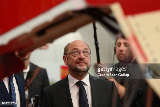 German chancellor candidate and head of the German Social Democrats Martin Schulz visits an assembly hall of the A320 passenger plane series at the...
