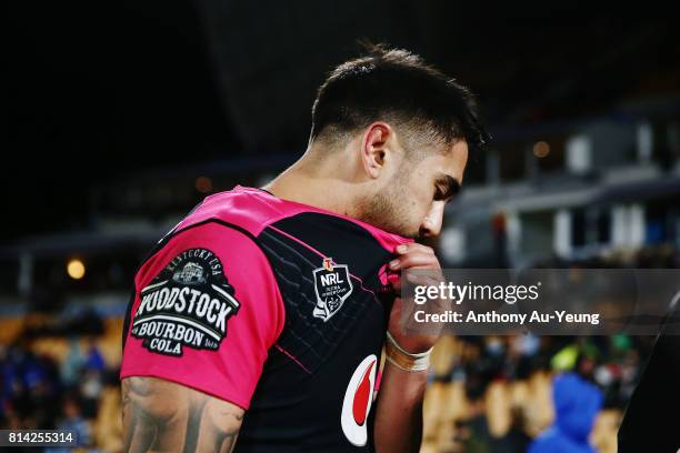 Shaun Johnson of the Warriors walks off the field after picking up an injury during the round 19 NRL match between the New Zealand Warriors and the...