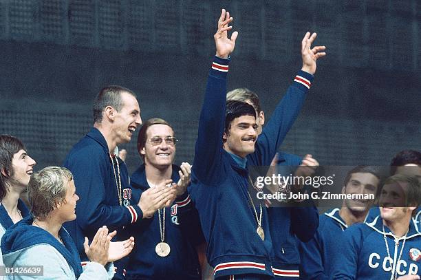 Mark Spitz, Steve Genter, Fred Taylor in medal ceremony for Men's 4 × 200 metre medley relay tournament at the 1972 Summer Olympics , Munich, West...
