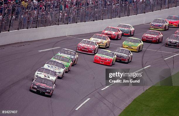 Auto Racing: NASCAR Daytona 500, Dale Earnhardt in action, leading pack during race, Daytona, FL 2/15/1998