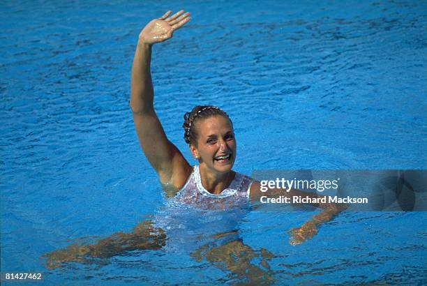 Synchronized Swimming: 1992 Summer Olympics, CAN Sylvie Frechette victorious after finishing solo routine, Barcelona, ESP 8/2/1992